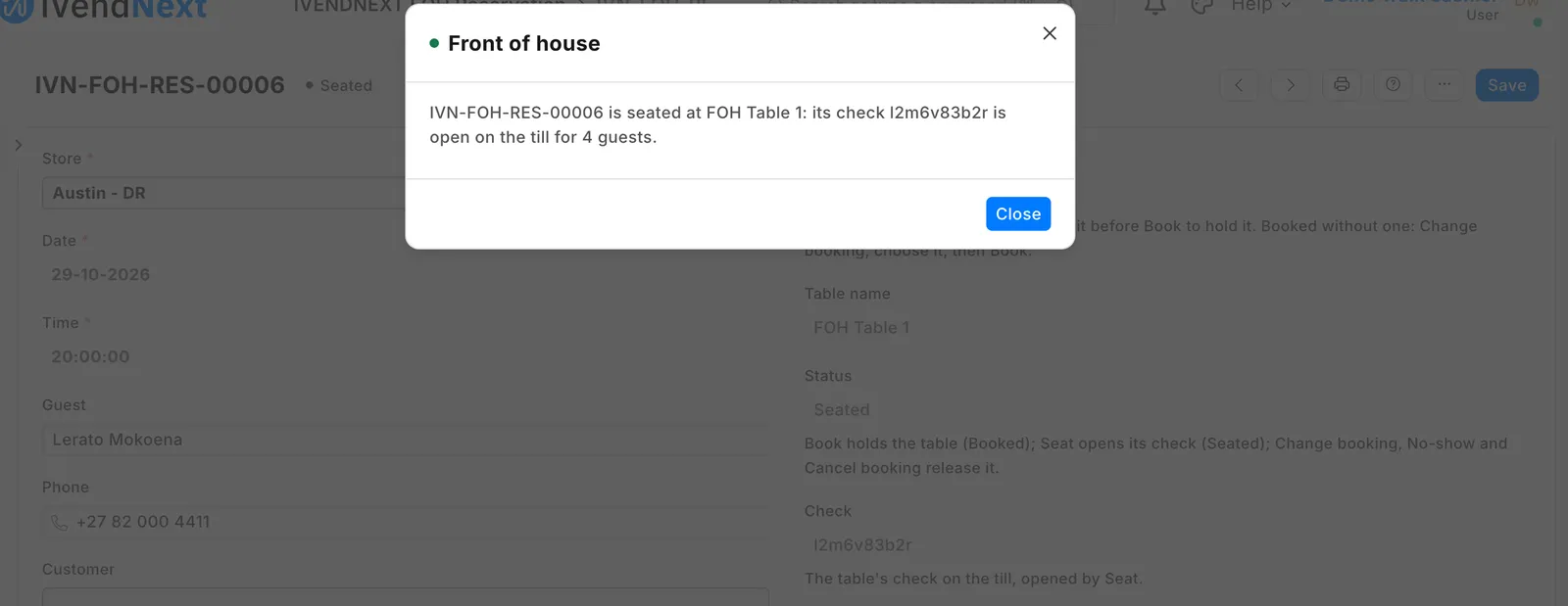 The booking after Seat on a demo site: seated at FOH Table 1, its check open on the till for 4 guests